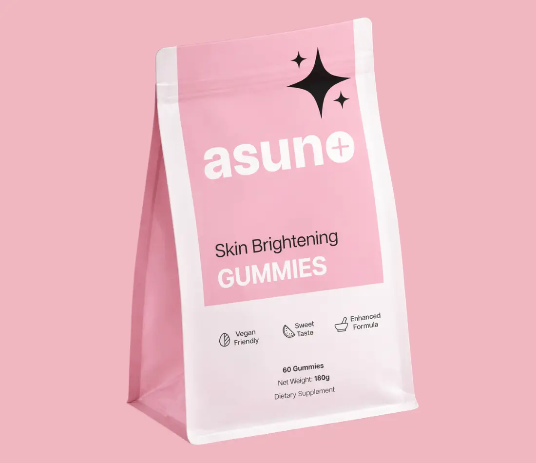 A pink and white resealable bag of Asuno Skin Brightening Gummies, a vegan friendly dietary supplement for skin health